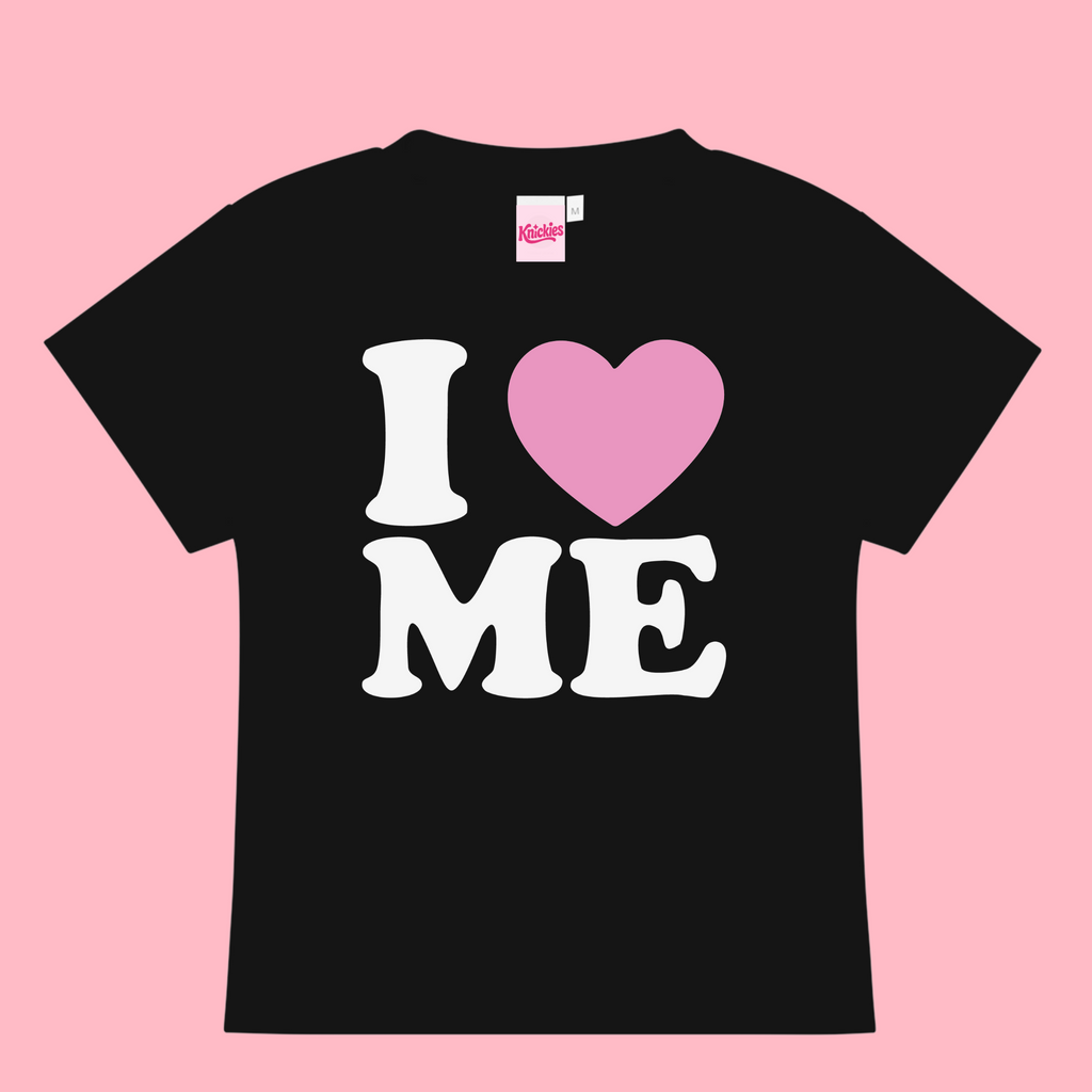 Black t-shirt with 'I ❤️ ME' text on a pink background