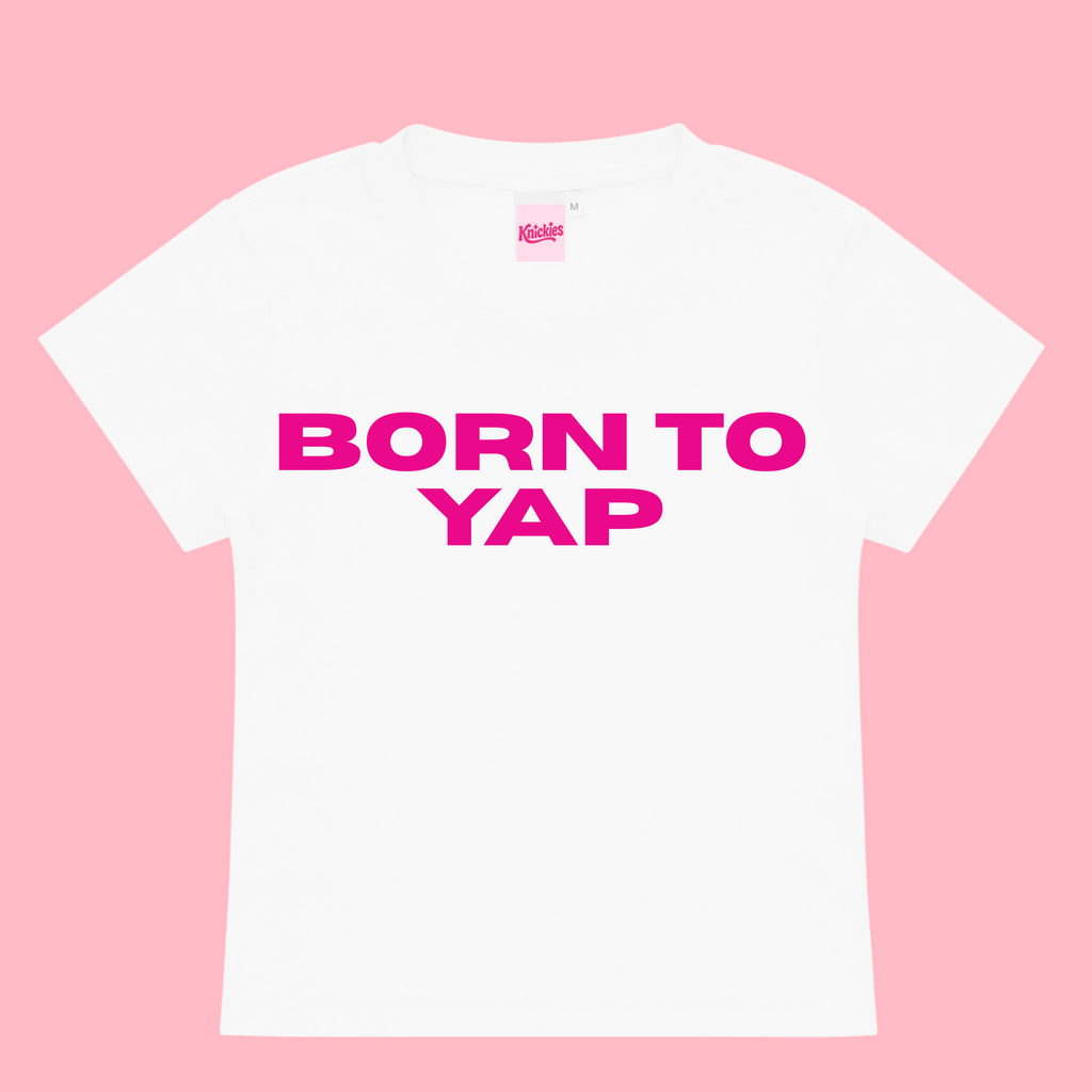 White t-shirt with pink text 'BORN TO YAP' on a pink background