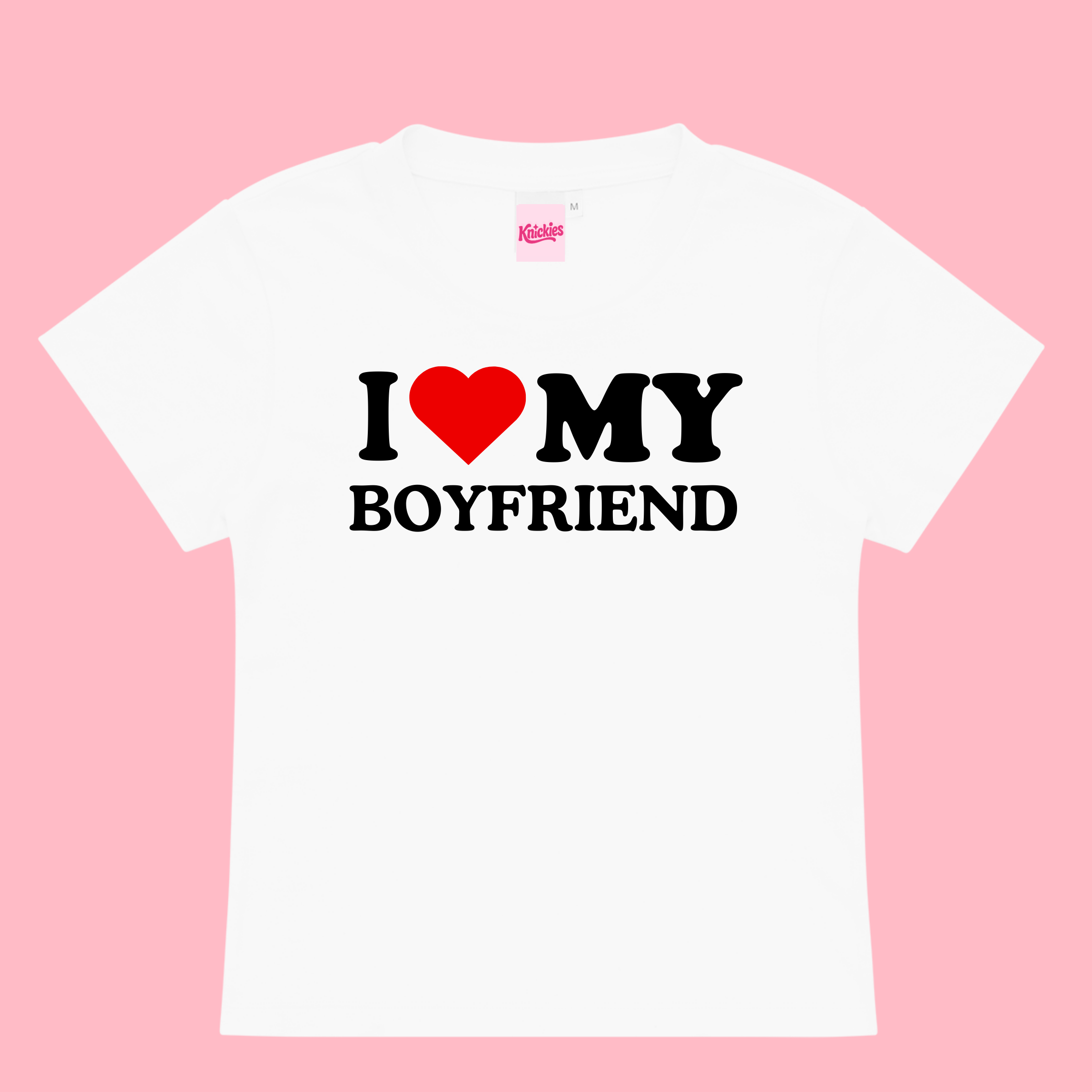 White t-shirt with 'I ❤️ MY BOYFRIEND' text on a pink background