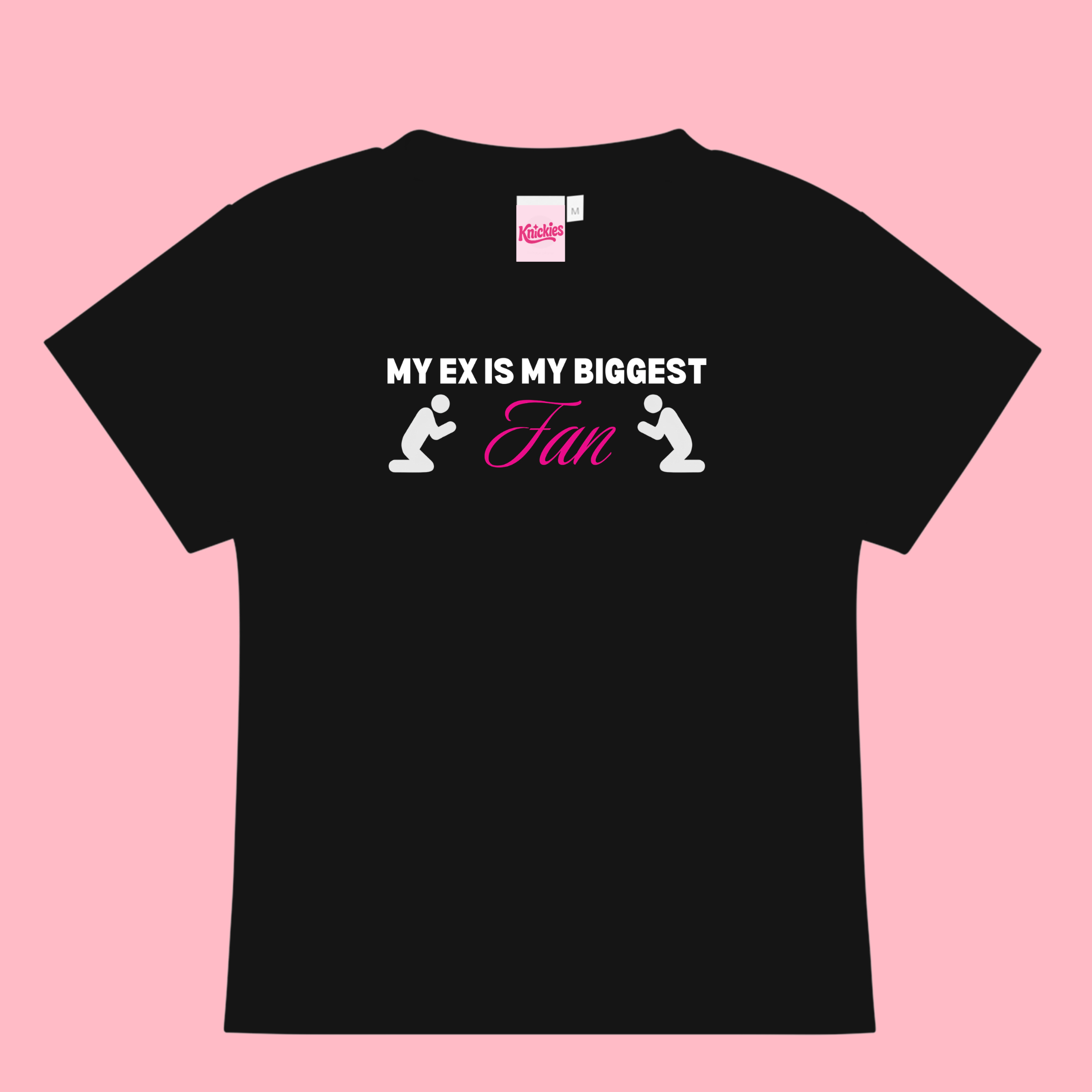 Black t-shirt with humorous text design on a pink background