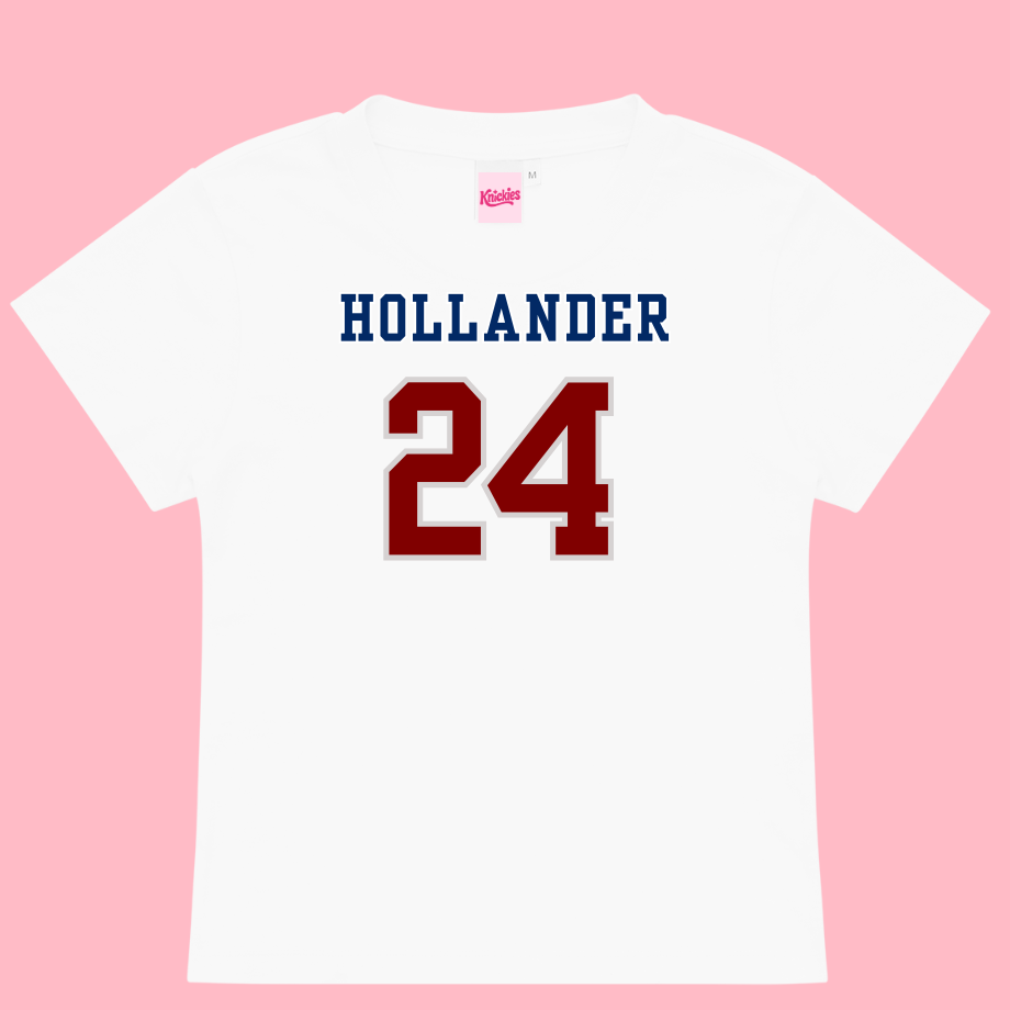 White t-shirt with 'HOLLANDER 24' printed on a pink background